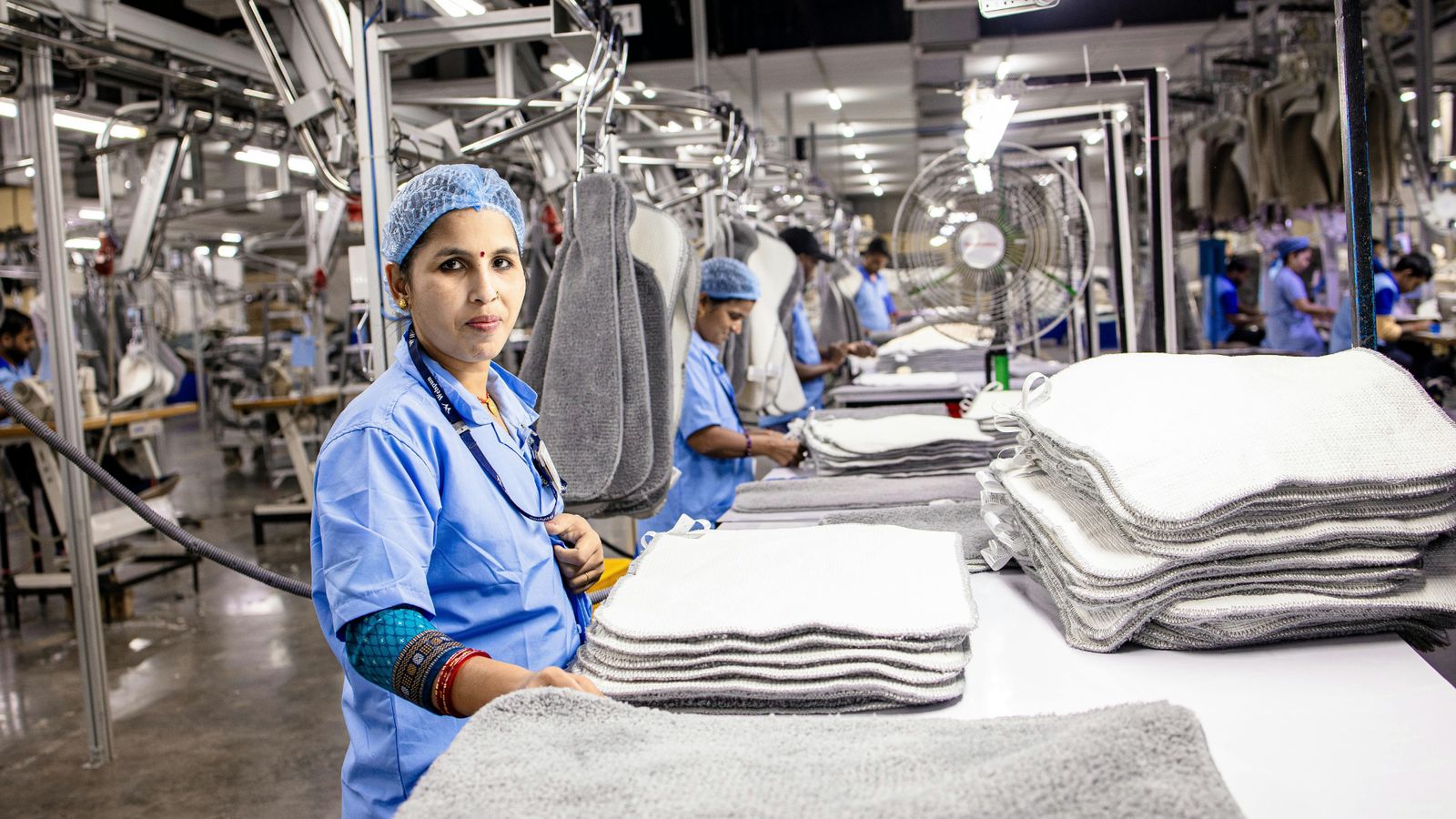 Workers on a textile production line in an Indian export factory